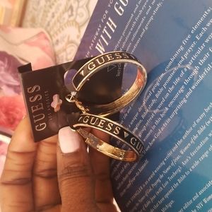 Gorgeous gold and black hoop guess earing